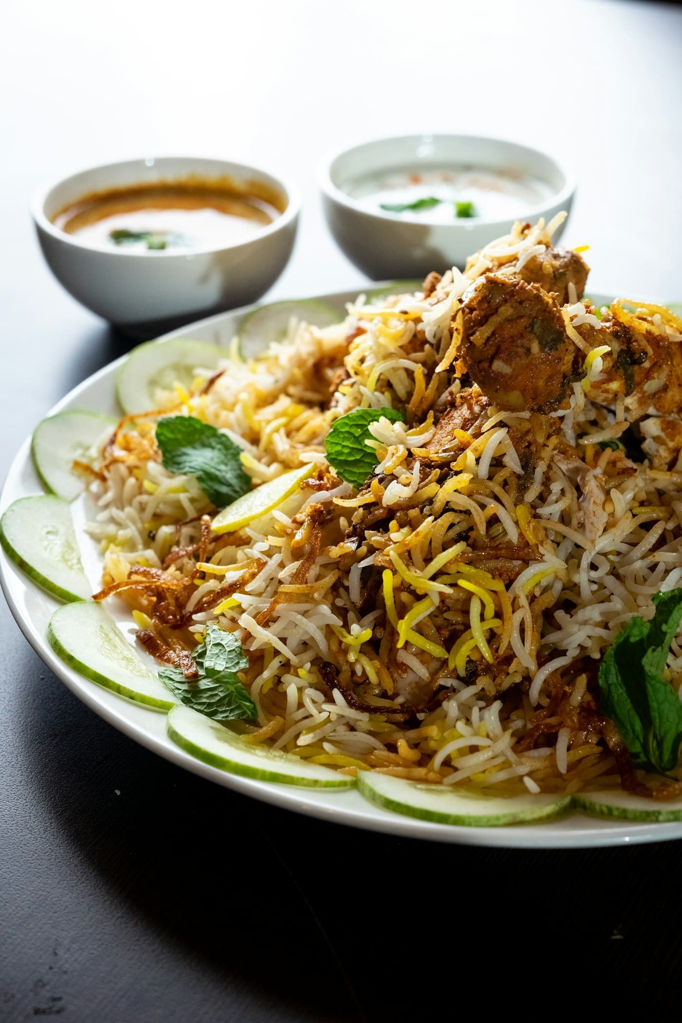 Hyderabadi chicken dum biryani with mint and fried onions