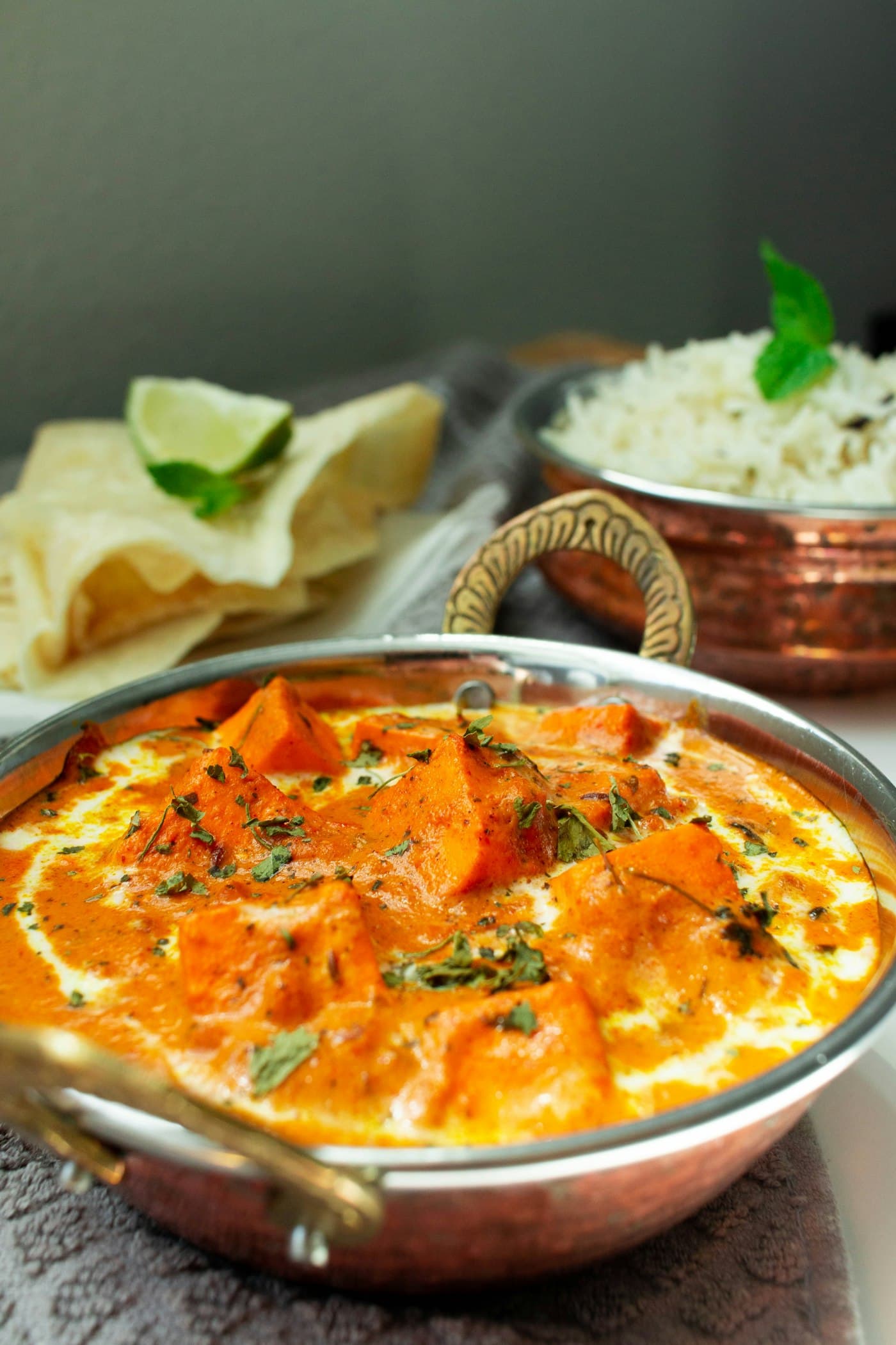Paneer butter masala in a copper kadai
